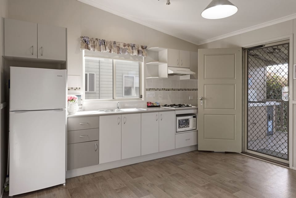 Deluxe 3 Bedroom Cabin | Private kitchen | Coffee/tea maker, fridge, microwave (on request), stovetop