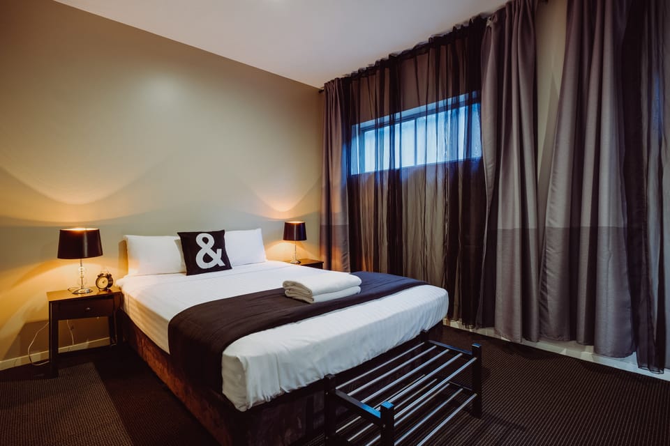 Executive Suite, 1 Bedroom, Accessible, Non Smoking | Iron/ironing board, cribs (free), WiFi (free), individually furnished