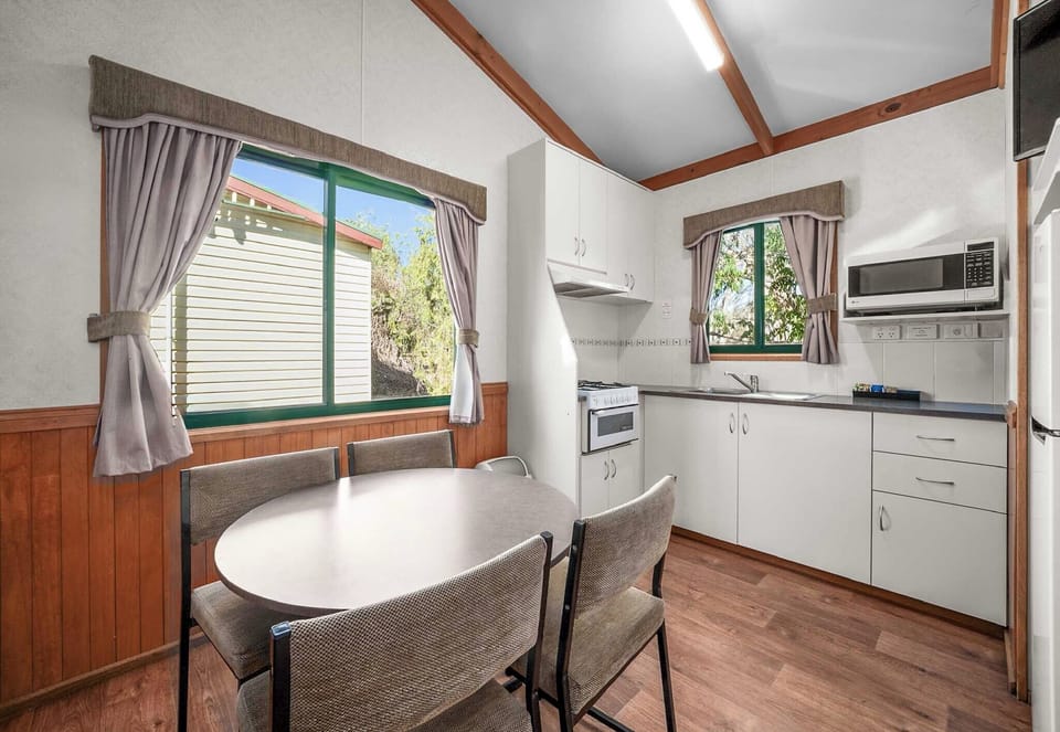Standard 2 Bedroom Cabin - Sleeps 4 - Not Pet Friendly | Dining room
