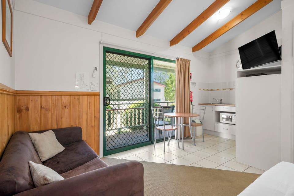 Standard Studio - Not Pet Friendly | Living area | TV, DVD player