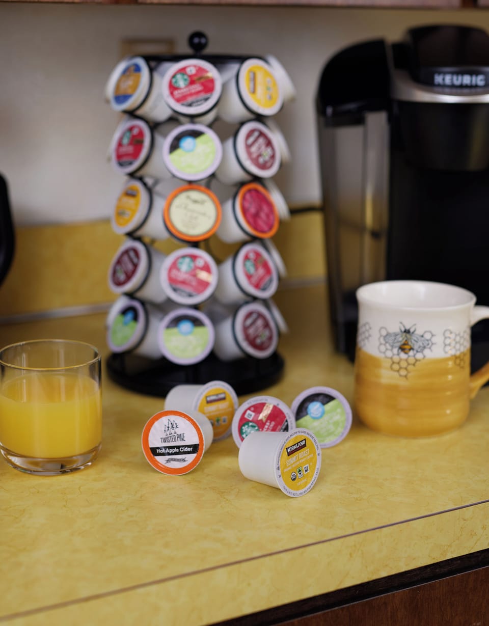 Well-stocked Keurig coffee station with assorted pods and morning-ready charm