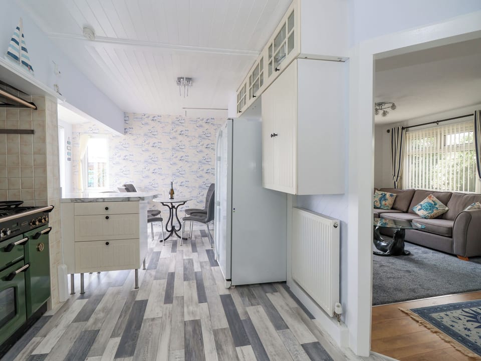 Fridge, electric kettle, toaster, cookware/dishes/utensils