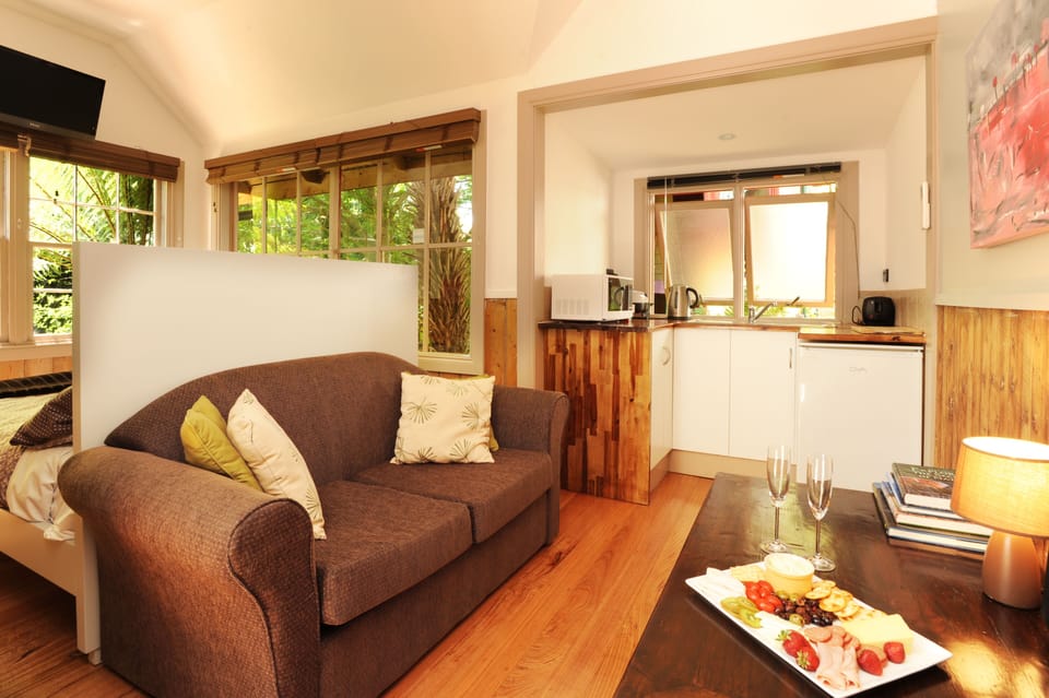 Caretaker's Cottage | Living area | TV, DVD player
