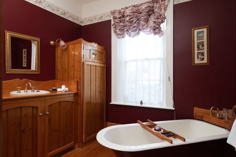 Separate tub and shower, jetted tub, rainfall showerhead