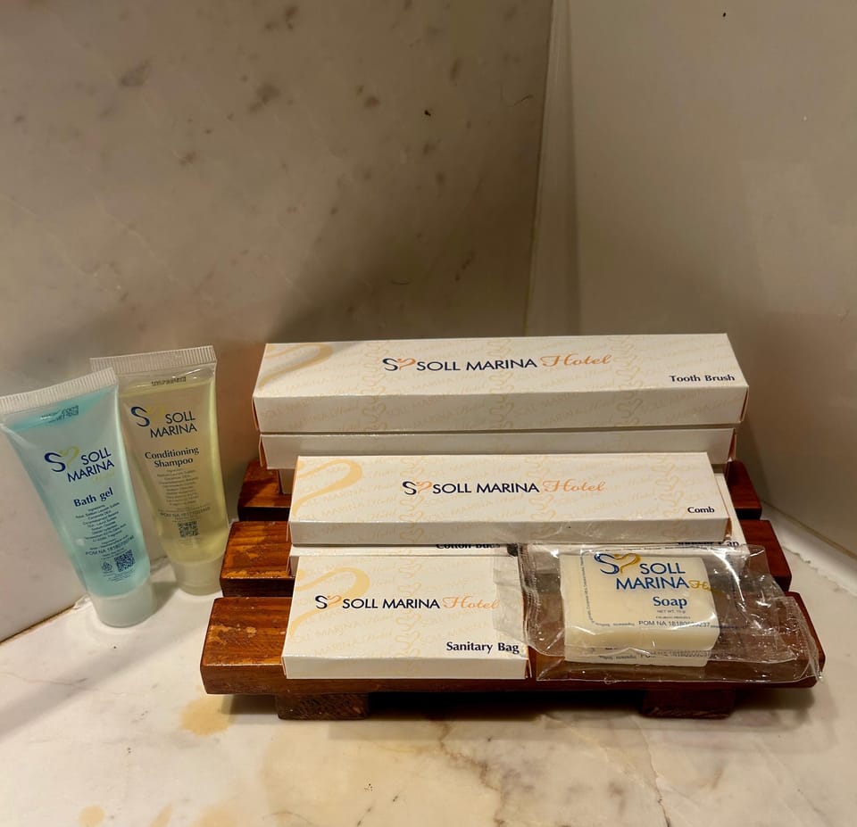 Shower, free toiletries, slippers, towels