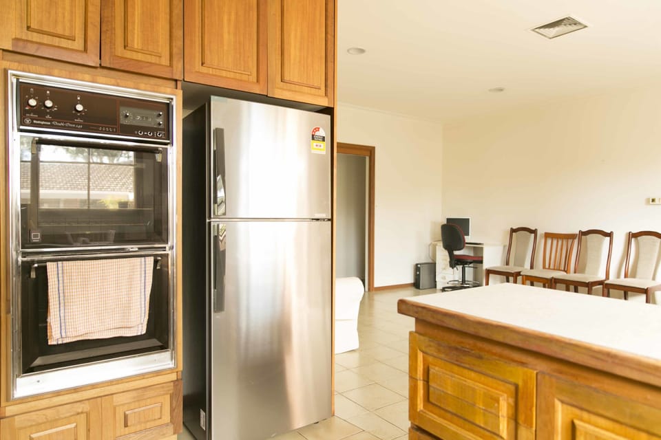 Four Bedroom Cottage | Private kitchen | Full-size fridge, microwave, oven, stovetop