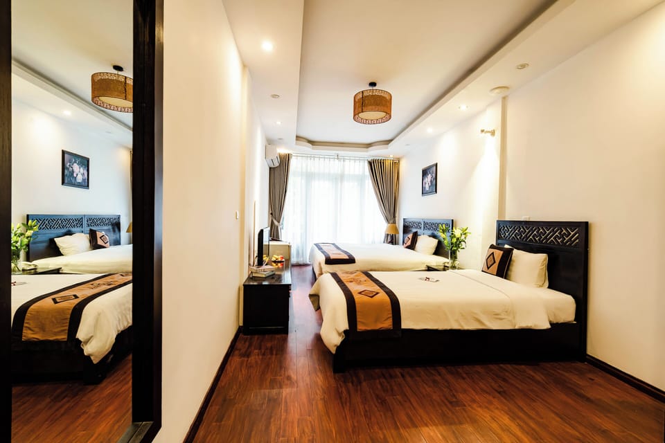 Family Suite | Minibar, in-room safe, blackout drapes, free WiFi