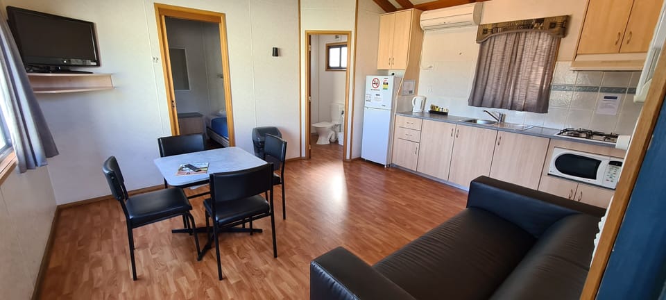 Standard Cabin, 2 Bedrooms, Non Smoking, Kitchen (Bungalow) | Living area | TV