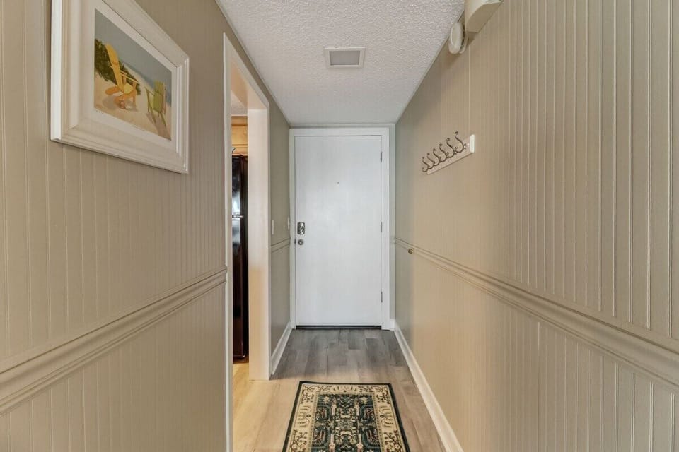 Hallway towards Front Door and Kitchen