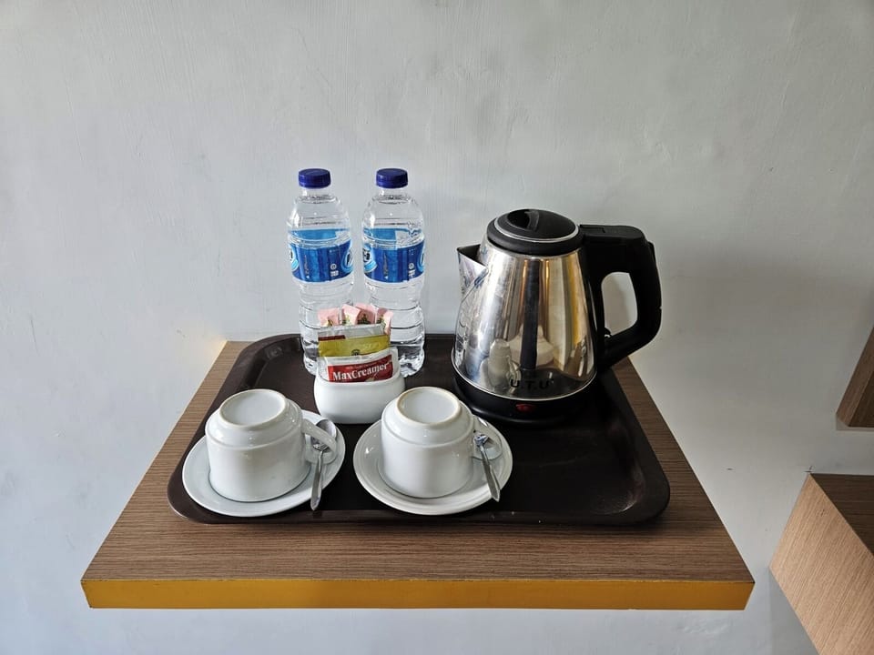 Deluxe Room | Coffee and/or coffee maker