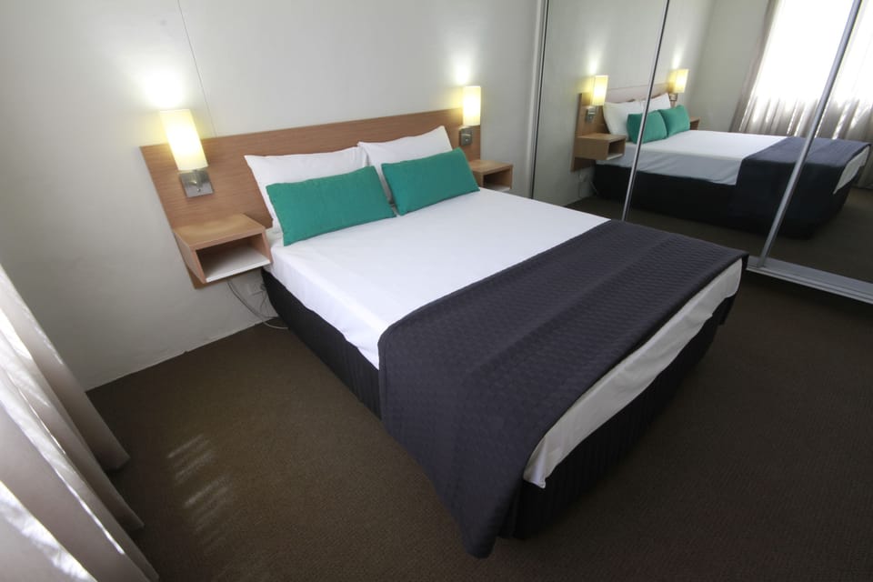 Family Suite, 2 Bedrooms, Non Smoking | Desk, iron/ironing board, bed sheets