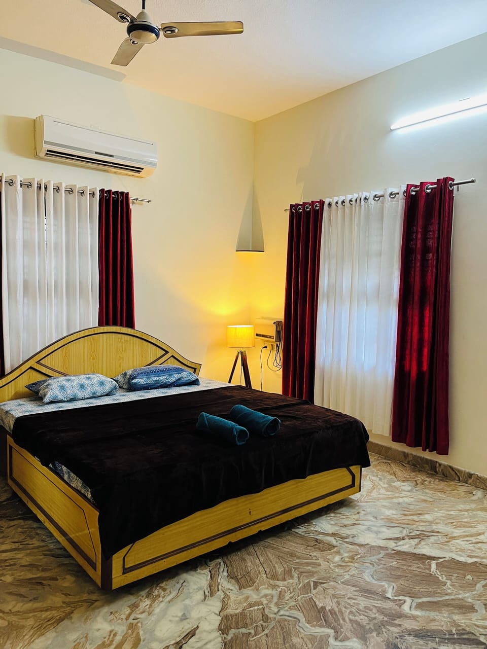 Bedroom with Air Conditioner and attached Bathroom