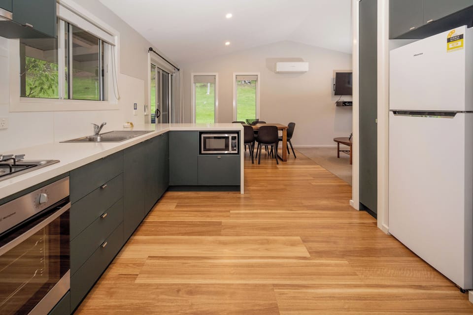 Two Bedroom Family Unit - 6 Berth (Linen Provided for Main Room ONLY - Photos Guide only) | Private kitchen | Fridge, microwave, electric kettle, toaster