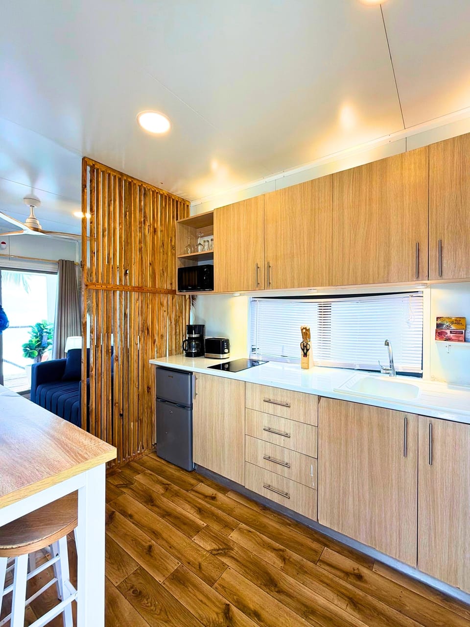Mini-fridge, microwave, stovetop, coffee/tea maker