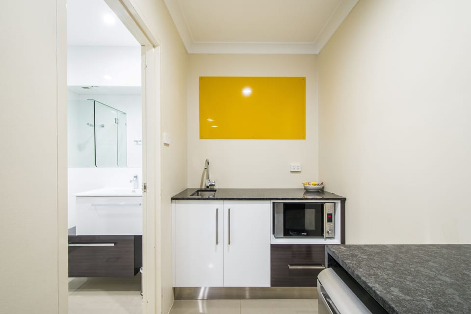 Family Room (Deluxe) | Private kitchenette | Coffee/tea maker, fridge, microwave, electric kettle