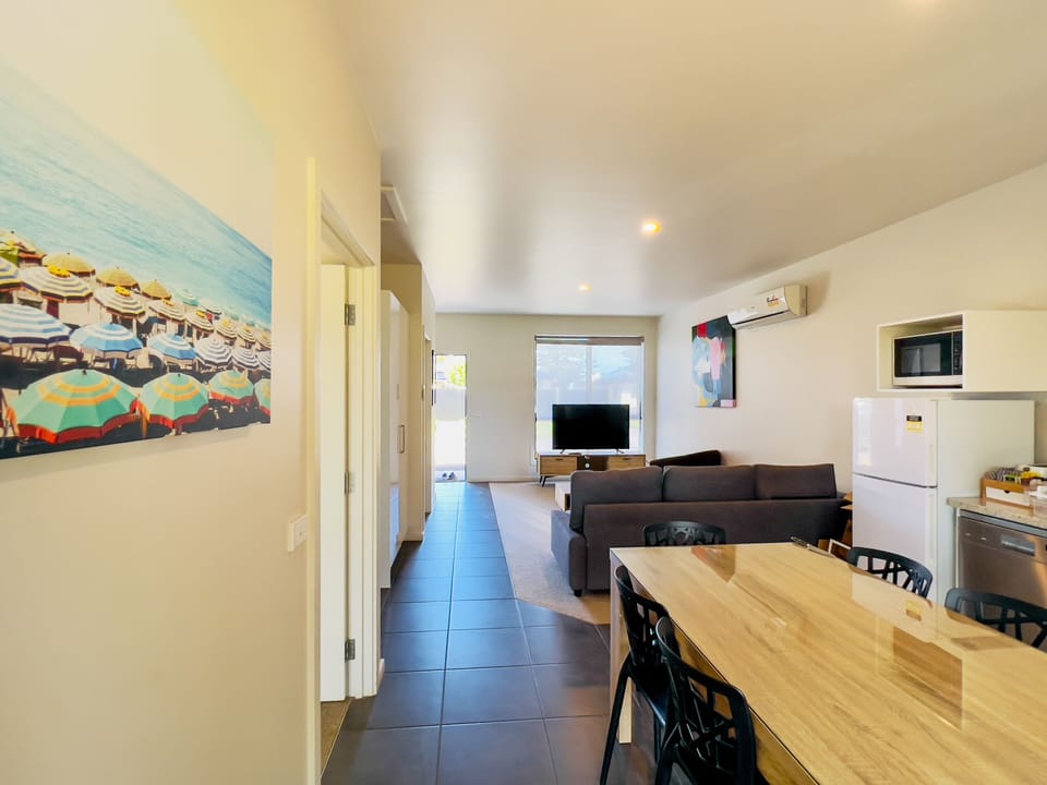 Self-Contained Deluxe 2 Bedroom, Accessible | Living area | LCD TV