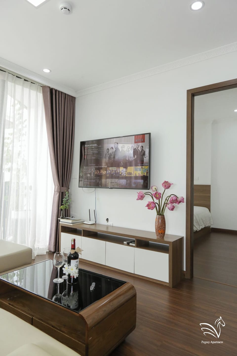 Family Twin Room, 2 Bedrooms, City View | Living area | Smart TV, fireplace
