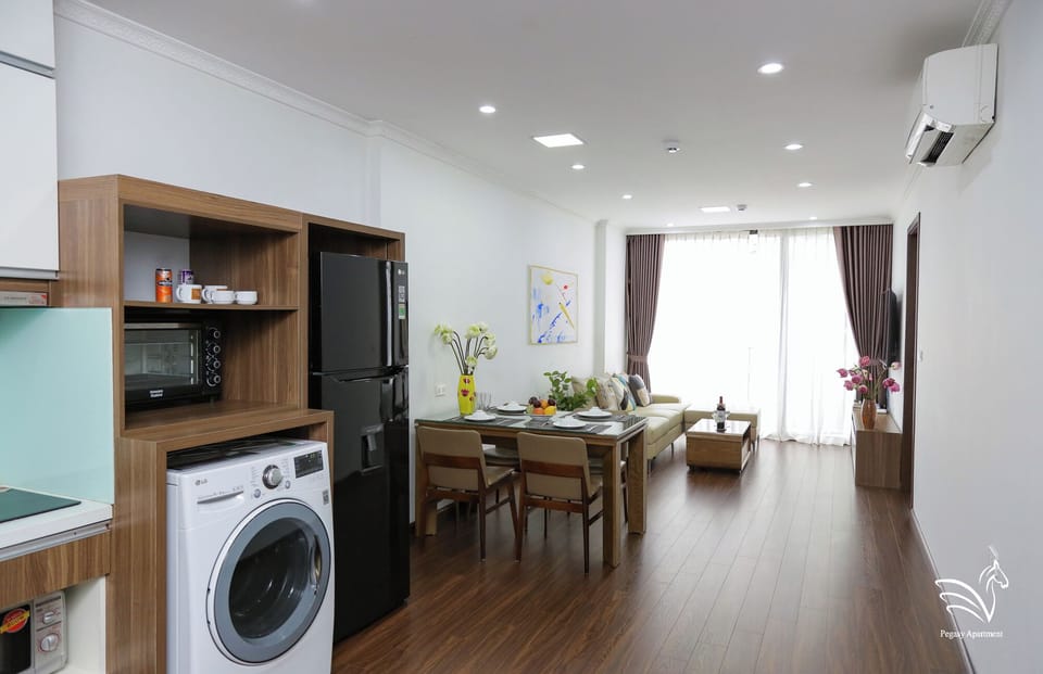 Family Twin Room, 2 Bedrooms, City View | Living area | Smart TV, fireplace