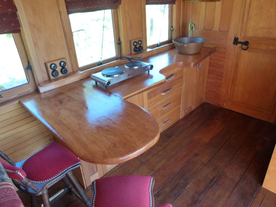 Train Carriage | Laptop workspace, iron/ironing board (on request), cribs (free)