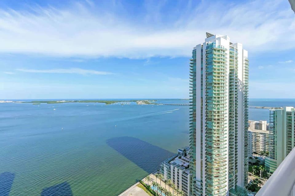 Large wrap-around balcony facing North and East with beautiful water views.