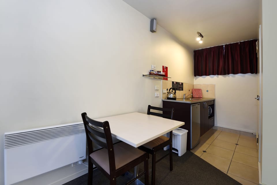 Executive Studio | Premium bedding, laptop workspace, blackout drapes, soundproofing