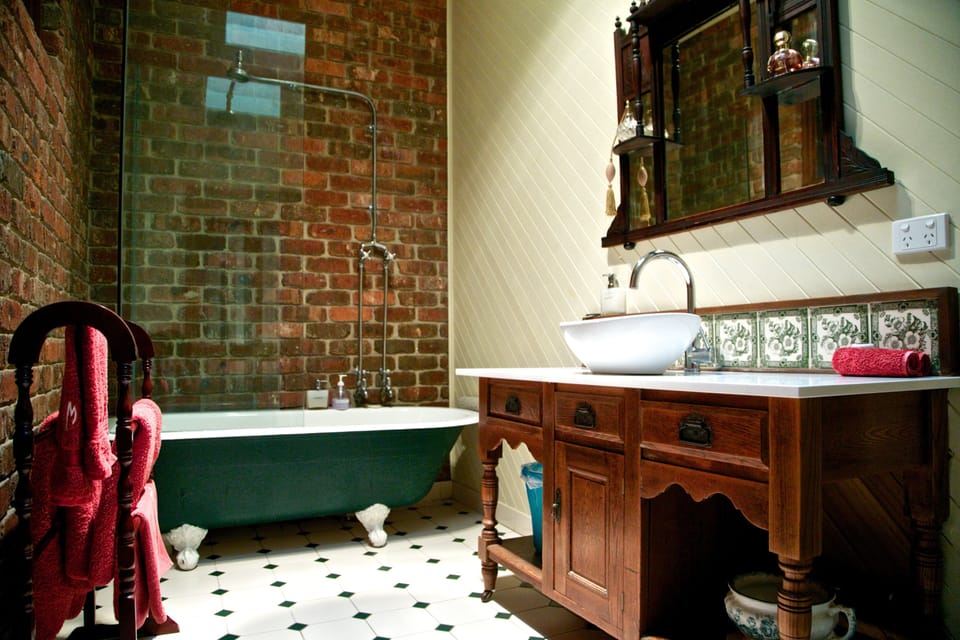 Cream Queen Suite | Bathroom | Hair dryer, towels
