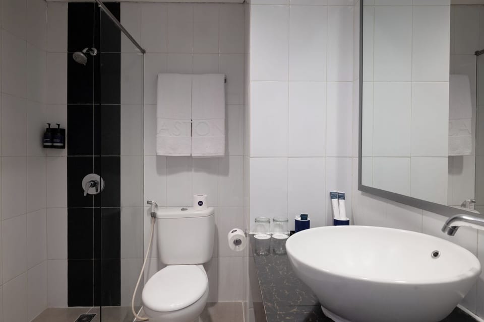 Shower, free toiletries, hair dryer, slippers