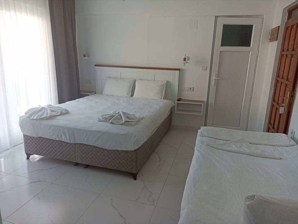 Standard Triple Room, 1 Bedroom | Free WiFi, bed sheets