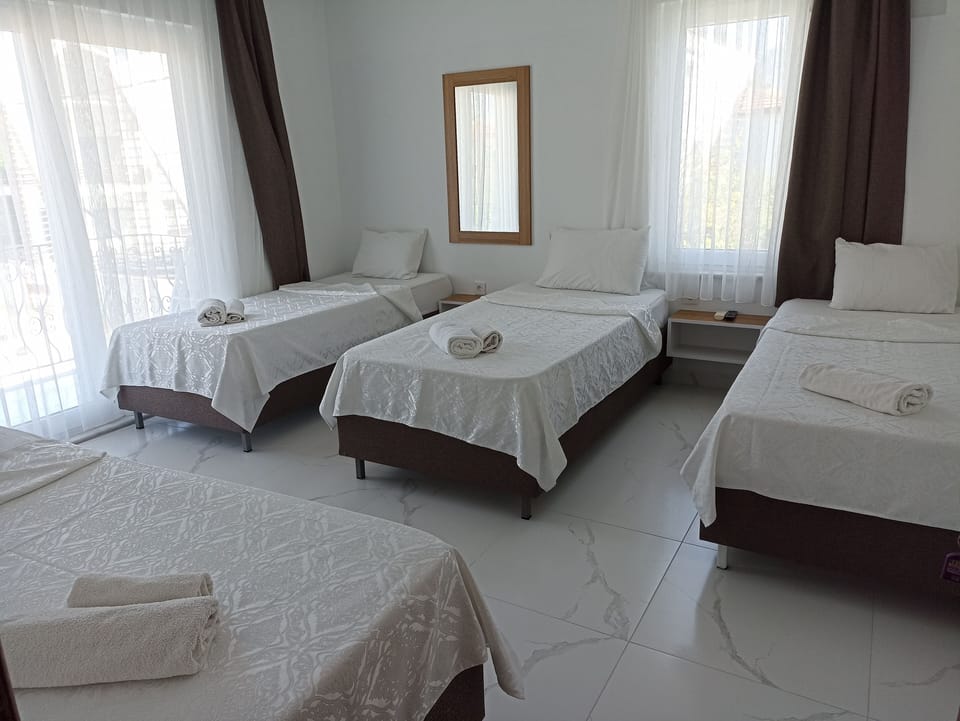 Standard Quadruple Room, 1 Bedroom | Free WiFi, bed sheets