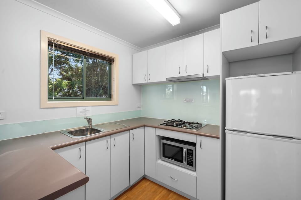 Superior 2 Bedroom Cabin - Not Pet Friendly | Private kitchen | Microwave, stovetop, toaster, cookware/dishes/utensils
