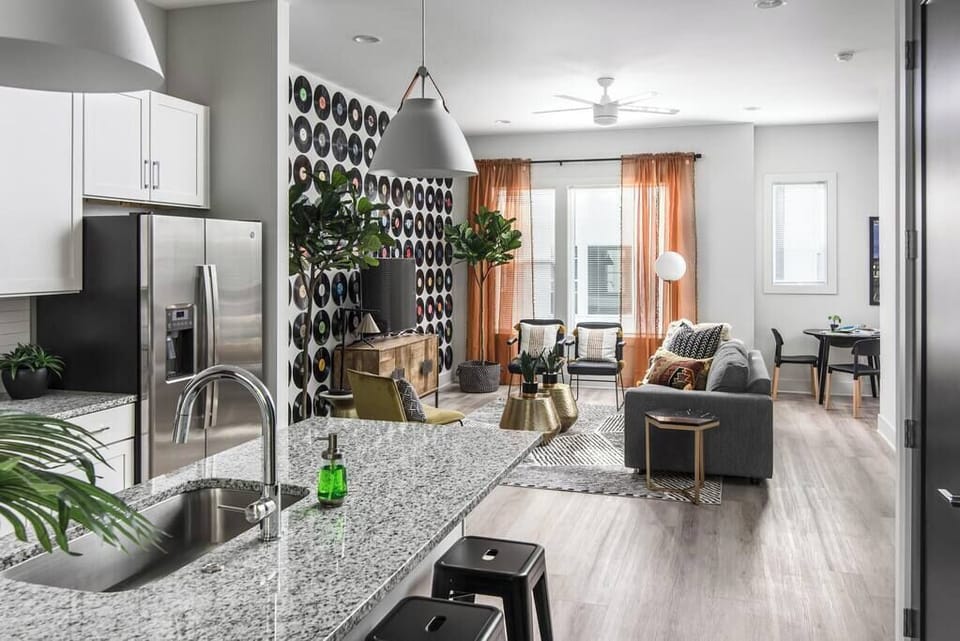 Open concept with kitchen flowing into the living room