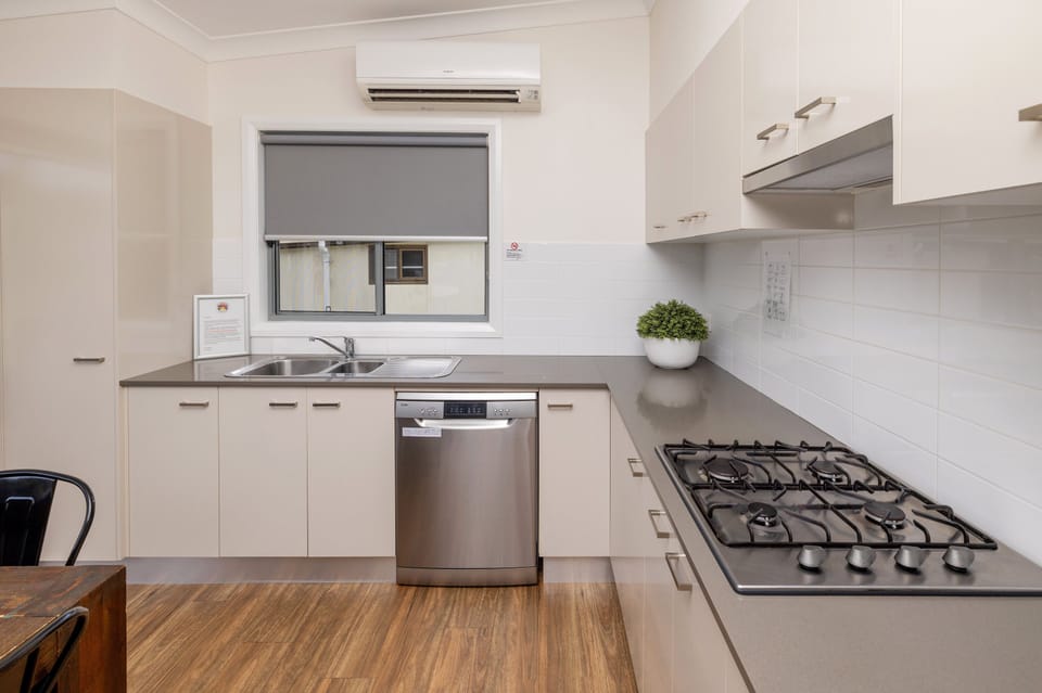 Family Bungalow, 3 Bedrooms | Private kitchen | Coffee/tea maker, full-size fridge, microwave, stovetop