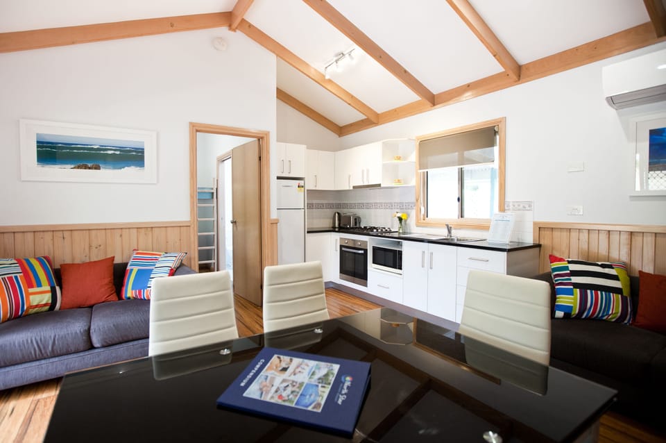 Palm Villa (2BR) | Living room | 42-inch Smart TV with digital channels, table tennis