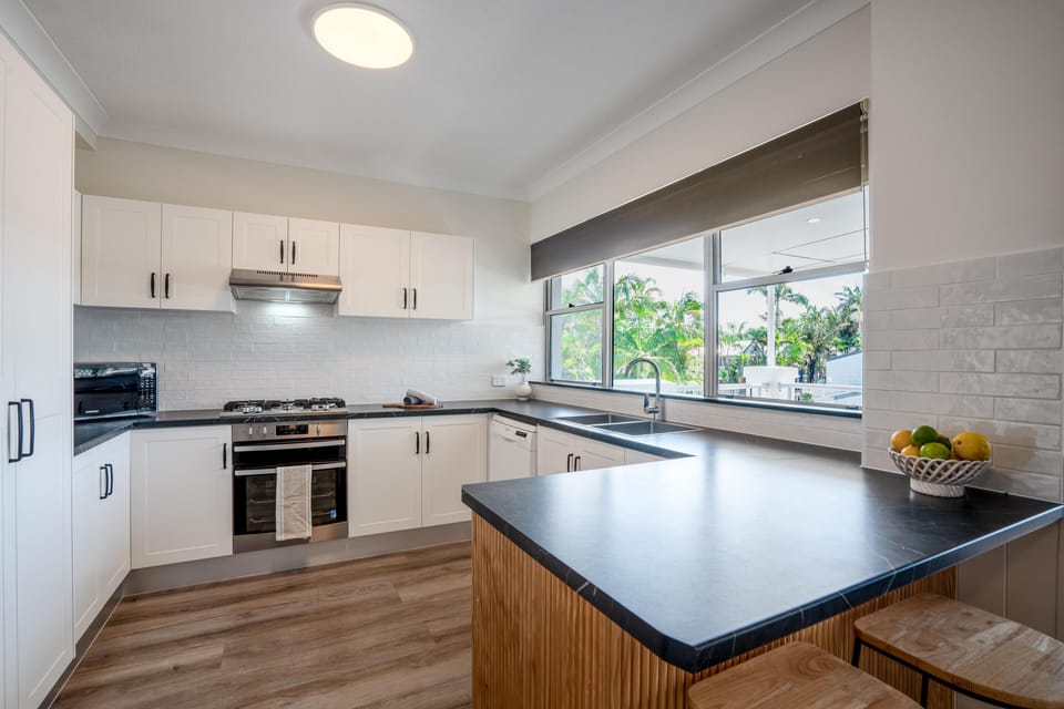 Apartment (2BR) | Private kitchen | Coffee/tea maker, full-size fridge, microwave, cookware/dishes/utensils