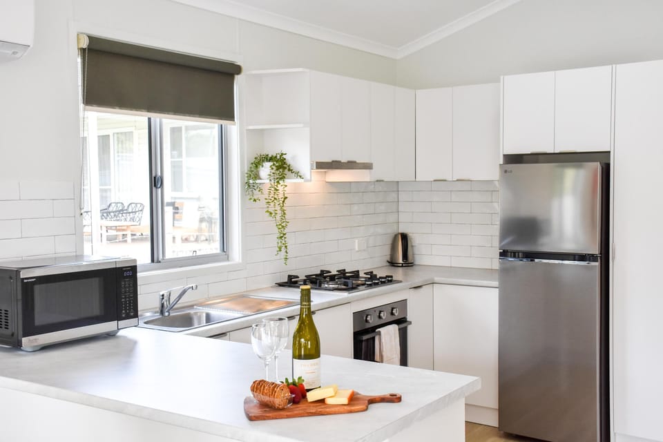 Driftwood Lodge (2BR) | Private kitchen | Coffee/tea maker, full-size fridge, microwave, cookware/dishes/utensils