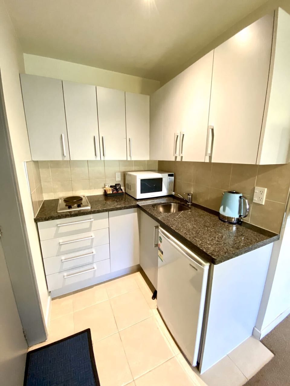 Family Apartment, 2 Bedrooms | Private kitchenette | Coffee/tea maker, electric kettle