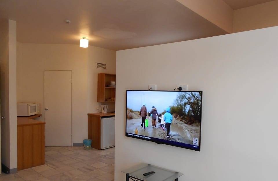 Standard Room, Non Smoking (Harrington Suite) | Living area | LED TV