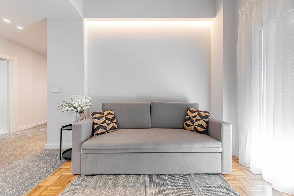 Deluxe Apartment | Living area | Smart TV