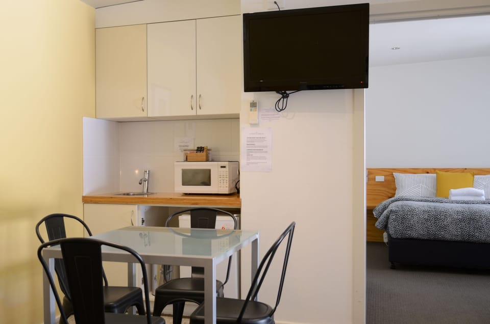 Family Room, 2 Bedrooms, Non Smoking (Connecting Suite) | Iron/ironing board, free WiFi, bed sheets