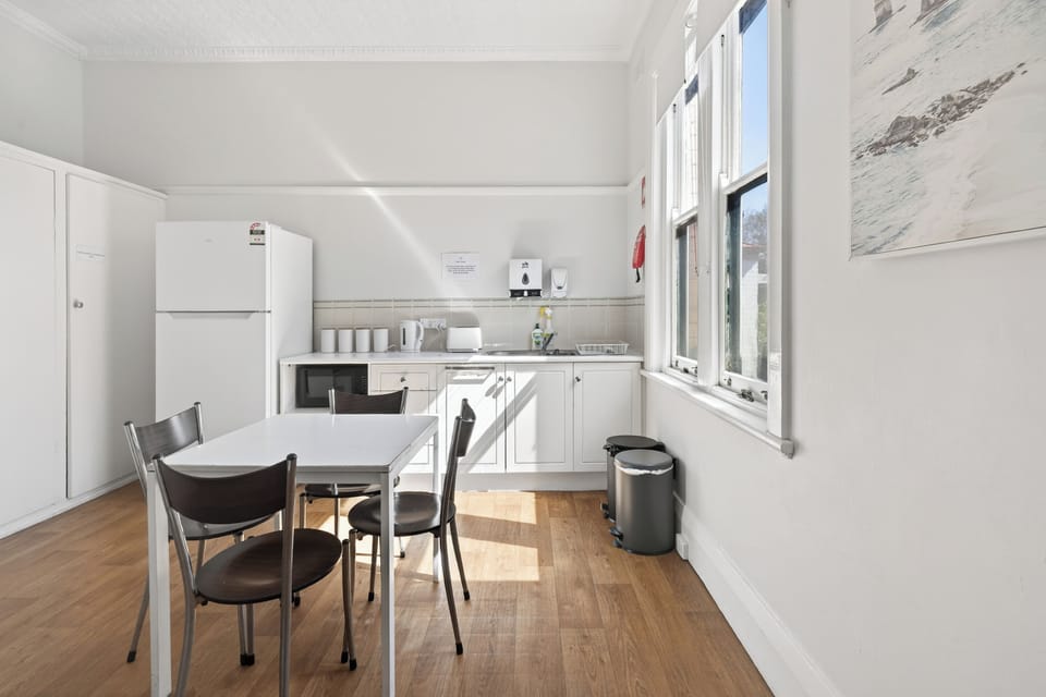 Full-size fridge, shared microwave