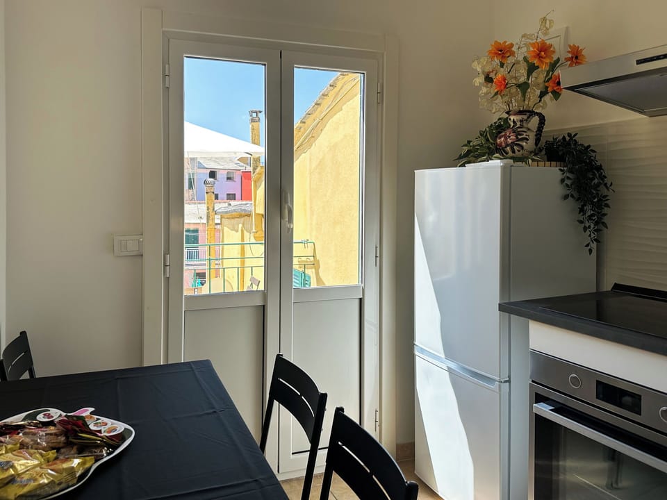 Apartment, 2 Bedrooms, Terrace, Beachside | Private kitchen | Full-size fridge, microwave, oven, stovetop