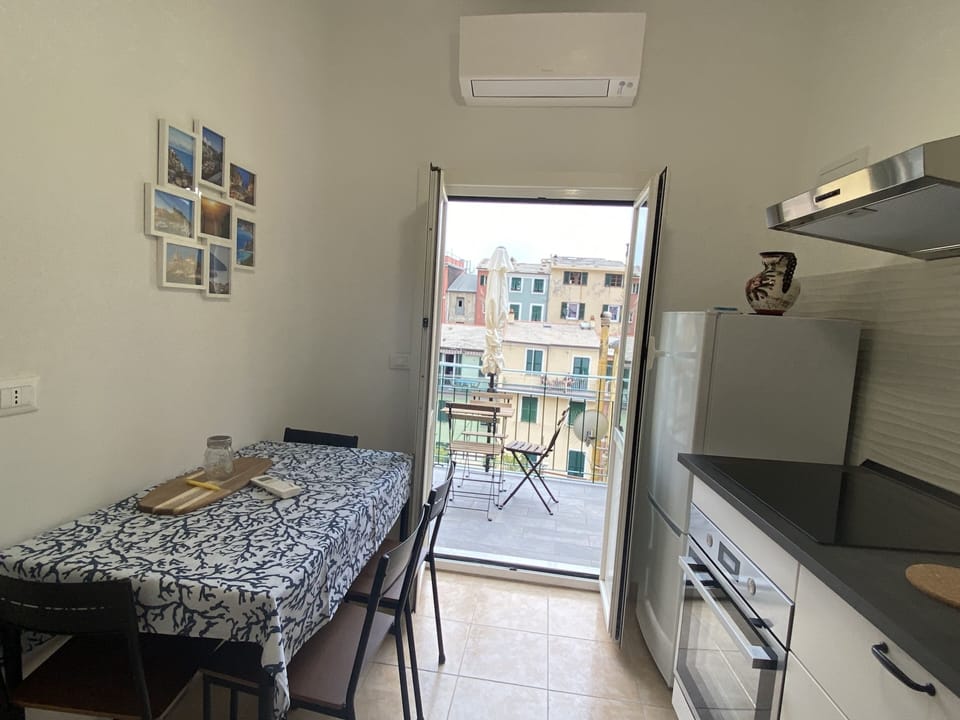 Apartment, 2 Bedrooms, Terrace, Beachside | Private kitchen | Full-size fridge, microwave, oven, stovetop