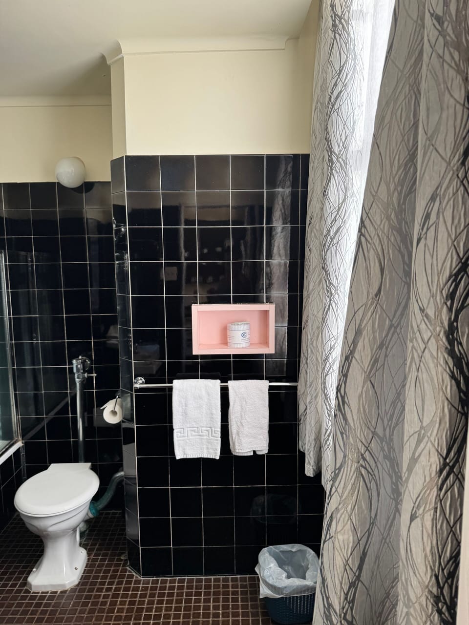 Rainfall showerhead, towels, soap, toilet paper