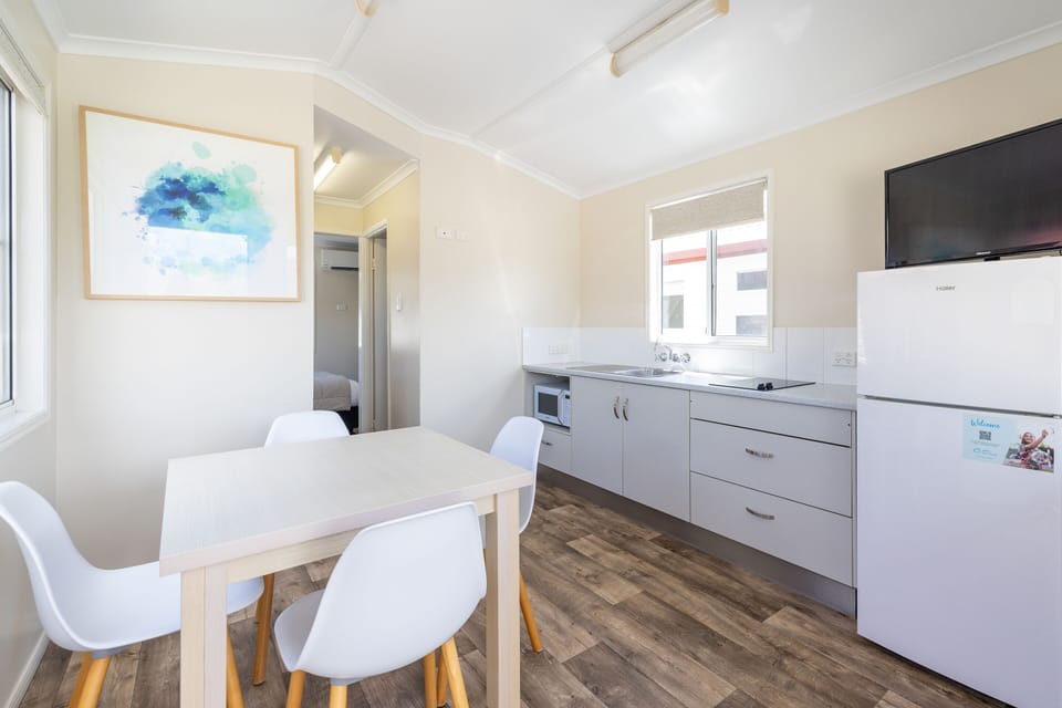 Standard Family Cabin | Private kitchen | Fridge, microwave, stovetop, electric kettle