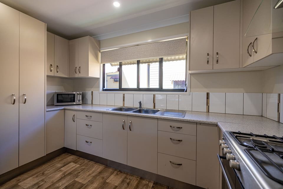 Palm Lodge | Private kitchen | Fridge, microwave, stovetop, electric kettle