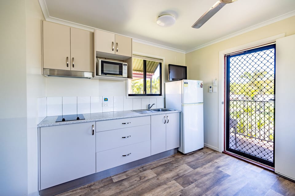 2 Bedroom Family Cabin | Private kitchen | Fridge, microwave, stovetop, electric kettle