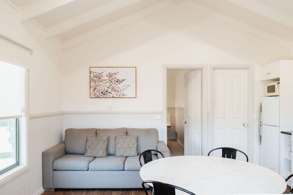 Deluxe Cabin, 1 Bedroom | Living area | LCD TV, DVD player