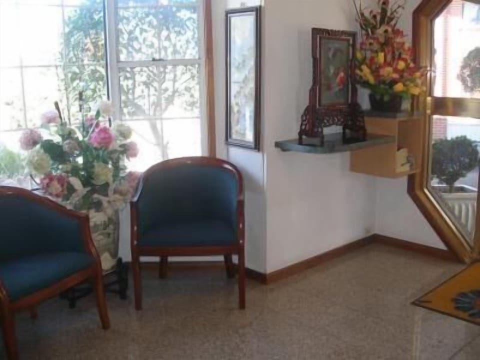 Standard Room, Non Smoking (Double Room) | Living area | 32-inch TV with cable channels