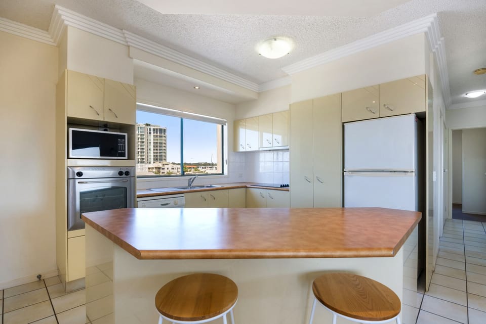 Apartment, 2 Bedrooms, Beachside | Private kitchen | Coffee/tea maker, full-size fridge, microwave, oven