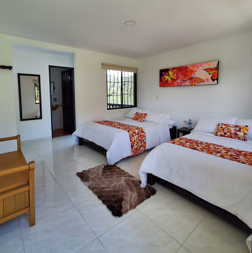 Family Triple Room | Down comforters, WiFi (free), bed sheets